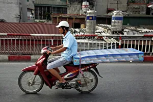 Scooters and traffic in Hanoi, Vietnam Scooters and traffic in Hanoi, Vietnam