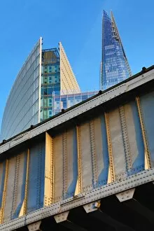 Images Dated 29th March 2014: The Shard building and metal railway bridge in London, England