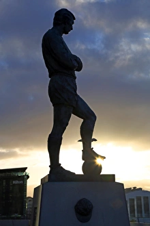 Silhouette of the statue of Bobby Moore at Wembley Stadium, London, England Silhouette of the statue of Bobby Moore at Wembley Stadium, London, England