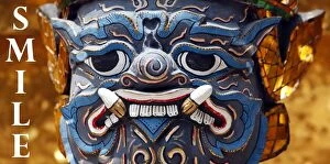 Mugs Collection: Smile souvenir of Thai Yaksha Demon Statue face mask, Wat Phra Kaew, Bangkok, Thailand