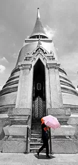 Images Dated 23rd June 2012: Spot colour pink umbrella at Phra Siratana Gold Chedi at Wat Phra Kaew, Bangkok, Thailand