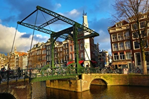 Staalstraat Bridge on Kloveniersburgwal Canal in Amsterdam, Holland Staalstraat Bridge on Kloveniersburgwal Canal in Amsterdam, Holland