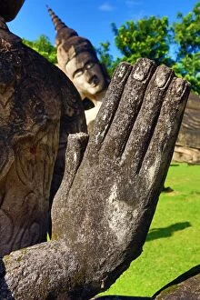 Images Dated 11th September 2015: Statue of praying hands, Buddhas, Buddha Park, Vientiane, Laos