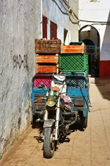 Morocco Collection: Street scene with a loaded motorcycle in the Medina of Rabat, Morocco