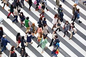 Street scene of people on a zebra crossing in Harajuku, Tokyo, Japan Street scene of people on a zebra crossing in Harajuku, Tokyo, Japan