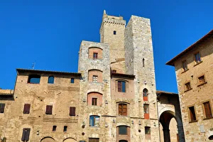 The Torre Grossa and buildings in the Piazza Cisterno in San Gimignano, Tuscany, Italy The Torre Grossa and buildings in the Piazza Cisterno in San Gimignano, Tuscany, Italy