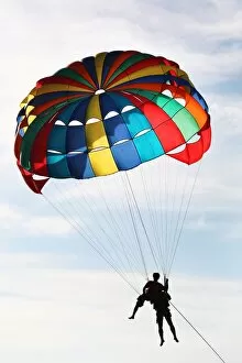 Phuket Collection: Tourists parascending with a parachute on Patong Beach, Phuket, Thailand