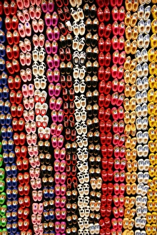 Traditional Dutch clogs souvenirs for tourists at the Flower Market in Amsterdam, Holland Traditional Dutch clogs souvenirs for tourists at the Flower Market in Amsterdam, Holland