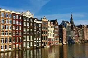Amsterdam Collection: Traditional houses on the Damrak canal in Amsterdam, Holland