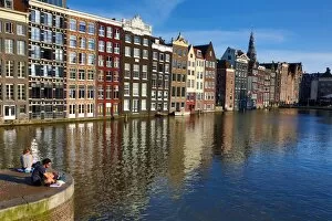 Amsterdam Collection: Traditional houses on the Damrak canal in Amsterdam, Holland