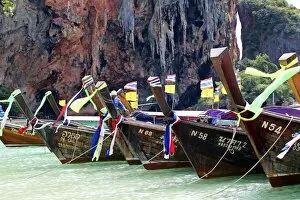 Images Dated 1st December 2012: Traditional Thai long tail boats at Phranang Cave Beach, Railay Beach, Krabi, Phuket, Thailand