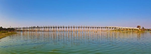 The U Bein Bridge across the Taungthaman Lake in Amarapura, Mandalay, Myanmar (Burma) The U Bein Bridge across the Taungthaman Lake in Amarapura, Mandalay, Myanmar (Burma)