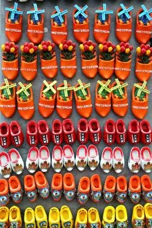 Images Dated 6th June 2016: Wooden clogs fridge magnets on sale in the flower market in Amsterdam, Holland