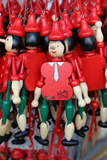 Wooden Pinocchio puppets on sale, Florence, Italy