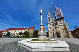 Images Dated 27th May 2016: Zagreb Cathedral with tower renovation and Holy Mary Monument column in Zagreb, Croatia